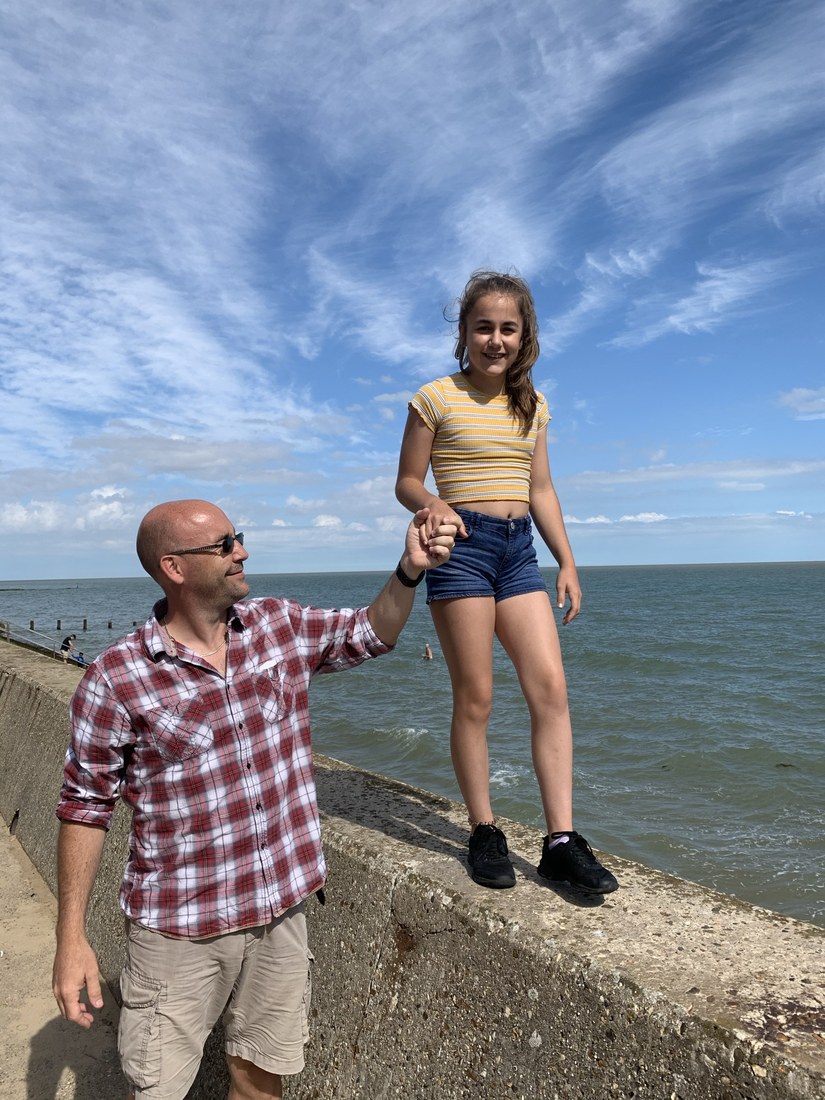 Mike and daughter by the sea